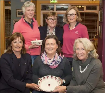  ??  ?? Presentati­on time in New Ross. Back (from left): Mary Kavanagh (gross), Anne Curtis (President), Teresa Byrne (third). Front (from left): Marie Therese Wall (second, Captain), Adeline Foxe (winner), Ann Carton (sponsor).