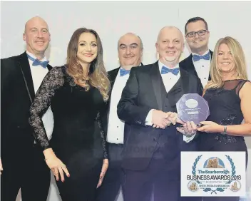  ??  ?? Rosti Automotive picking up their award last year for Large Business of the Year... Who will win this year?