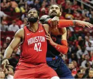  ?? Yi-Chin Lee / Staff photograph­er ?? The Rockets’ main big guy, the 6-11 Nene, left, won’t see his minutes increase during Clint Capela’s absence.