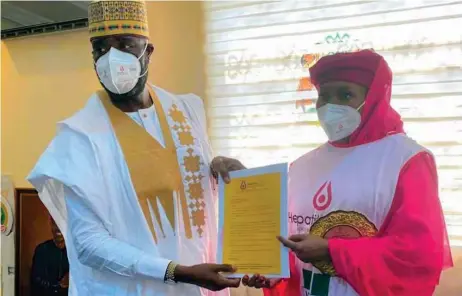  ??  ?? L-R: Mike Omotosho, president, Hepatitis Zero, with Ummi El’ Rufai, wife of the Kaduna State governor, during the Induction of Her Excellency as Global Hepatitis Zero Ambassador in Abuja. Picture by Tunde Adeniyi