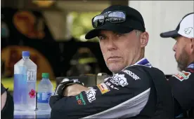  ?? ASSOCIATED PRESS FILE PHOTO ?? Kevin Harvick waits in his garage before a Cup Series practice earlier this year. Chase Elliott, according to Harvick, doesn’t race very smart. In fact, moving forward in NASCAR’s playoffs, Harvick plans to run all over the reigning Cup champion.