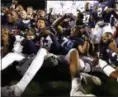  ?? BRYNN ANDERSON — ASSOCIATED PRESS ?? Auburn defensive lineman Andrew Williams (79) celebrates with the team after the Tigers’ 40-17 win over Georgia on Nov. 11.