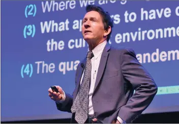  ?? Dan Watson/The Signal ?? Mark Schniepp, Ph.D, director of the California Economic Forecast, speaks during the 2021 Economic Outlook event held at the Santa Clarita Performing Arts Center at College of the Canyons, Valencia on Friday.