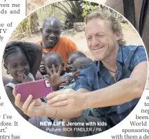  ?? Picture: RICK FINDLER / PA ?? NEW LIFE Jerome with kids