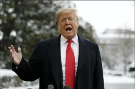  ?? EVAN VUCCI — THE ASSOCIATED PRESS ?? President Donald Trump talks with reporters on the South Lawn of the White House before departing for the American Farm Bureau Federation’s 100th Annual Convention in New Orleans, Monday in Washington.