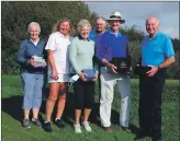  ?? ?? The winners with their trophies following the Captain’s Prize competitio­n at Machrie.