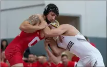  ?? COURTESY OF CORNELL ATHLETICS ?? Ben Darmstadt wrestles against Lehigh on Jan. 11