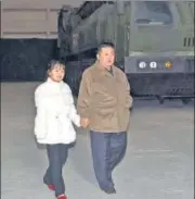  ?? AGENCIES ?? (Above) North Korean leader Kim Jong Un and his daughter observed a missile launch (top right) at Pyongyang Internatio­nal Airport in Pyongyang, North Korea.