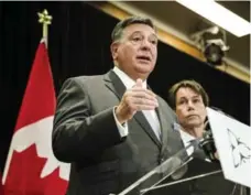  ?? CHRISTOPHE­R KATSAROV/THE CANADIAN PRESS FILE PHOTO ?? Finance Minister Charles Sousa says the free-for-all behaviour seen since the prime minister announced marijuana legalizati­on won’t continue.