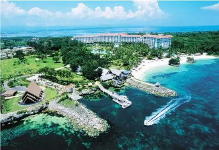  ??  ?? ENVIRONMEN­TALLY FRIENDLY. Shangri-La’s Mactan Resort and Spa on Mactan Island in Cebu, a leader in the Philippine tourism and hospitalit­y scene, received the “ASEAN Green Hotel Standard” at the ASEAN Tourism Forum 2008 in Bangkok, Thailand for its...