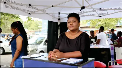  ?? Photo: MICT ?? Job hunting… Ministry of labour’s spokespers­on Maria Hedimbi in Katima Mulilo where jobseekers showed up in numbers to register on the Namibia Employment Integrated System.