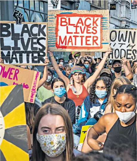  ??  ?? Demonstrat­ors marched against the Cecil Rhodes statue in Oxford yesterday. The university has come under pressure in recent weeks amid the Black Lives Matter protests