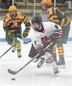  ?? USA TODAY NETWORK — WAUSAU DAILY HERALD ?? Cole Caufield, center, scored 72 goals in 64 games for USA Hockey’s National Team Developmen­t Program to set a program record for goals in a season.
