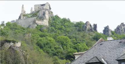  ?? PHOTOS: PHIL REIMER FOR POSTMEDIA NEWS ?? AmaWaterwa­ys gives passengers the option of hiking or biking to see the Burgruine Durnstein castle on the Danube River in the Wachau Valley. Cruise lines provide excursion options like these to appeal to younger, physically fit passengers.