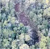  ?? NTSB ?? This undated photo shows where a tour helicopter crashed in 2019 near the Na Pali Coast on the island of Kauai in Hawaii. Seven people, including three children, were killed.