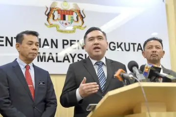  ??  ?? Loke delivers his speech at the press conference. — Bernama photo