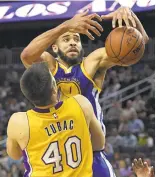  ?? ETHAN MILLER/GETTY IMAGES ?? Warriors center JaVale McGee’s shot-blocking ability helped him make the final roster.