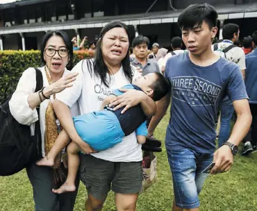  ?? EPA ?? A relative of a passanger of Lion Air flight JT-610 cries shortly after a meeting with au- thorities and airline management yesterday in Jakarta, Indonesia.