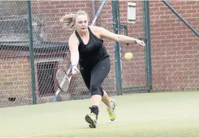  ??  ?? Victorious Abby Brennan in action on her way to the ladies singles title