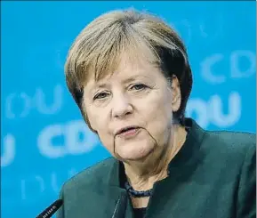  ?? SEAN GALLUP / GETTY ?? Angela Merkel, ayer en la sede de su partido, la CDU, en Berlín