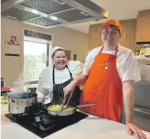  ?? ?? Student Aron Harris, with tutor Amanda Pichon, left, has been making huge progress in the kitchen after attending the course for more than two years.