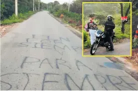  ?? CORTESíA ?? La propaganda escrita sobre la vía, y en el recuadro, la bandera del Eln.