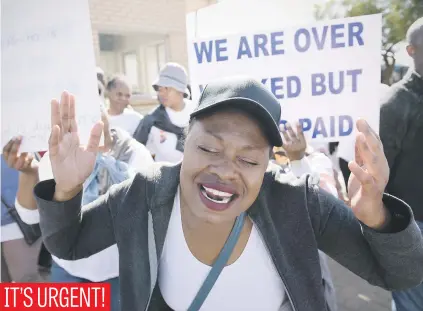  ?? Picture: Refilwe Modise ?? Agents from the 10111 call centre picket outside the police service’s Midrand command centre yesterday. Workers are embroiled in a wage dispute and are demanding pay increases.
