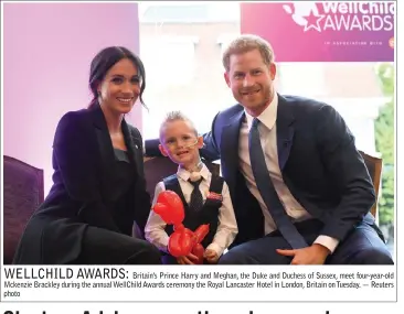  ?? — Reuters photo ?? Britain’s Prince Harry and Meghan, the Duke and Duchess of Sussex, meet four-year-old Mckenzie Brackley during the annual WellChild Awards ceremony the Royal Lancaster Hotel in London, Britain on Tuesday.