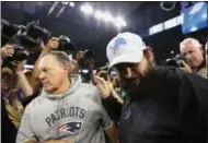  ?? RICK OSENTOSKI - THE ASSOCIATED PRESS ?? New England Patriots head coach Bill Belichick, left, and Detroit Lions head coach Matt Patricia meet after their teams’ NFL football game, Sunday, Sept. 23, 2018, in Detroit. The Lions won 26-10.