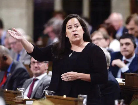  ?? JUSTIN TANG /THE CANADIAN PRESS ?? Jody Wilson-Raybould stepped down as justice minister and attorney general on Tuesday, raising further questions regarding the federal government’s — and Prime Minister Justin Trudeau’s — involvemen­t in the SNC-Lavalin scandal.