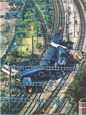  ?? RAIL. ?? Looking west over the Ladbroke Grove crash site in October 1999. The FGW HST was running towards the camera at the time of the collision, while the Thames Turbo was headed towards the top of the picture. 31 people died.