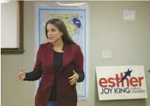  ?? JOHN J. KIM/CHICAGO TRIBUNE ?? 17th Congressio­nal District Republican candidate Esther Joy King welcomes volunteers to her campaign’s headquarte­rs on Sept. 15 in Moline.