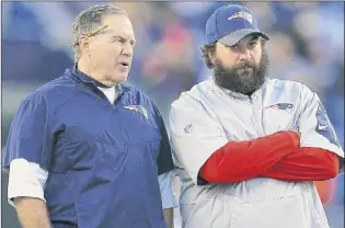  ?? Maddie Meyer / Getty Images ?? Patriots head coach Bill Belichick, left, talking to his former defensive coordinato­r Matt Patricia last season, has a 14-8 record against his former assistant coaches.