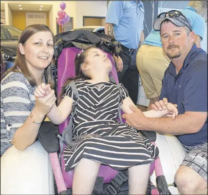  ?? FRAM DINSHAW/TRURO DAILY NEWS ?? Caitlyn Fraser is one happy little girl after she and her family were presented with a Hippocampe Stroller, through Children’s Wish Foundation.