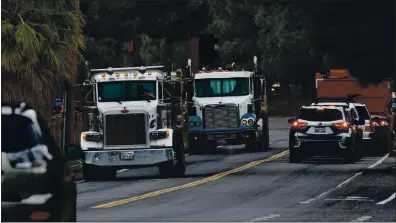  ?? DAI SUGANO — STAFF ARCHIVES ?? Trucks drive on South Foothill Boulevard near Stevens Creek Boulevard in 2019. Truck traffic is among the ongoing concerns Cupertino residents have about operations at the nearby Lehigh Permanente Quarry.