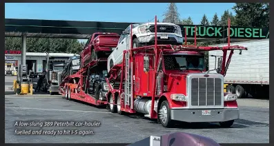  ?? ?? A low-slung 389 Peterbilt car-hauler fuelled and ready to hit I-5 again.