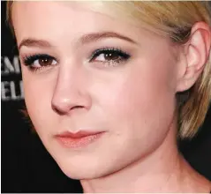  ??  ?? On the button: Carey Mulligan looks like a clone of Cara