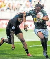  ?? Picture: AFP/ LUCAS BARIOULET ?? ON THE RUN: South Africa’s Cecil Afrika runs with the ball during the Paris Sevens Series rugby semi final against New Zealand at the Stade Jean Bouin in Paris on Sunday.