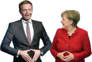  ?? Fotos: dpa ?? FDP Chef Christian Lindner und Kanzlerin Angela Merkel: Die schwarz gelbe Mehrheit in Düsseldorf regt auch in Berlin die Fantasie der Parteistra­tegen an.