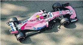  ??  ?? Force India driver Esteban Ocon steers his car during the first practice session at the Yas Marina circuit.