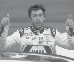  ?? SEAN GARDNER/GETTY ?? Chase Elliott, driver of the No. 9 NAPAAuto Parts Chevrolet, celebrates after winning the NASCAR Cup Series Bank of America ROVAL 400 on Sunday.