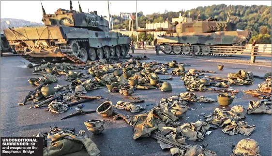  ??  ?? UNCONDITIO­NAL SURRENDER: Kit and weapons on the Bosphorus Bridge