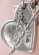  ??  ?? Pendant: Engraved with his name