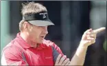  ?? Scott Heppell / AP ?? Nick Faldo of England gestures Monday during a practice round for the British Open.