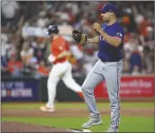  ?? KEVIN M. COX/AP ?? TEXAS RANGERS RELIEF PITCHER BROCK BURKE reacts after giving up a two-run home run to Houston Astros’ Kyle Tucker during the seventh inning of a game on Friday in Houston.