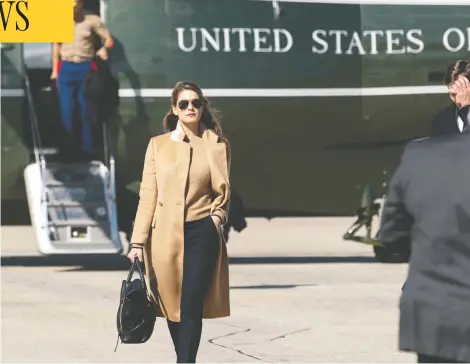  ?? ALEX BRANDO/THE ASSOCIATED PRESS ?? White House aide Hope Hicks goes to join President Donald Trump on Air Force One early Wednesday, before her positive COVID test was revealed.