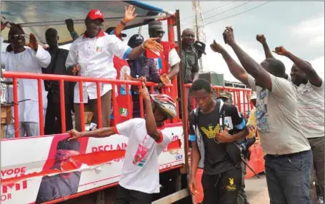  ??  ?? Governor-elect of Ekiti State, Dr. Kayode Fayemi, being congratula­ted by his supporters after his victory in last Saturday’s governorsh­ip election in Ado-Ekiti....yesterday