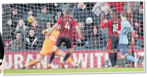  ??  ?? Dan Gosling fires home Bournemout­h’s late equaliser