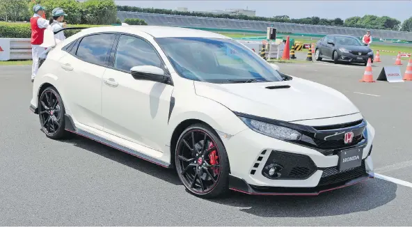  ?? GRAEME FLETCHER/DRIVING ?? The 2018 Honda Civic Type R is expected to arrive in Canada in the fall. Pricing has not been announced but is likely to be around $40,000.