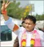  ?? IANS ?? S. Saidi Reddy of TRS flashes victory sign after defeating his nearest rival Padmavathi Reddy of Congress.